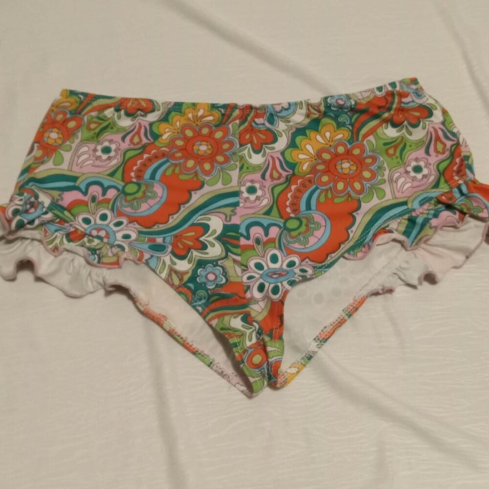 Very short, stretchy shorts with a vibrant hippie pattern